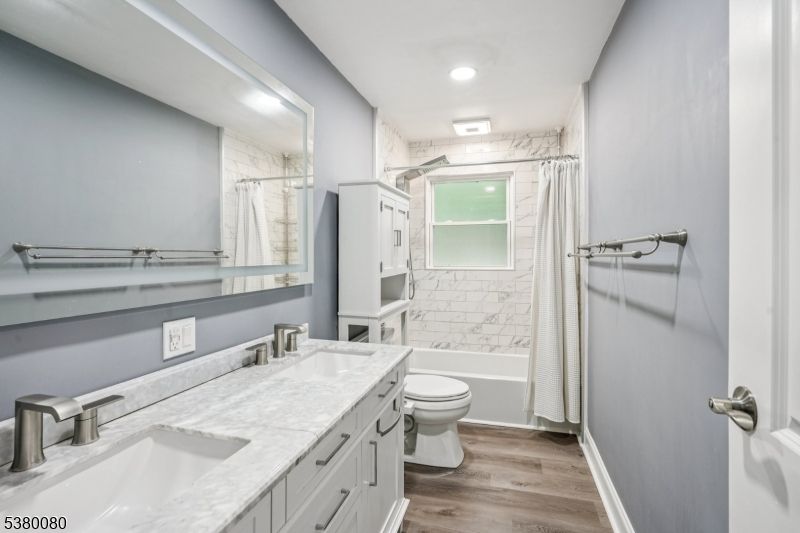 Bathroom, Dual Sink Vanities, Interior, Recessed Lighting, Wood Texture Flooring