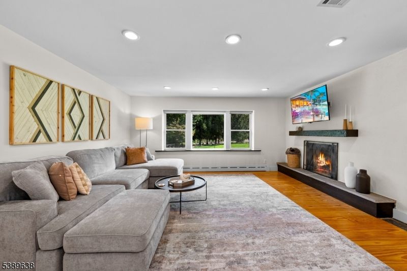 Fireplace, Interior, Living room, Recessed Lighting, Wood Texture Flooring