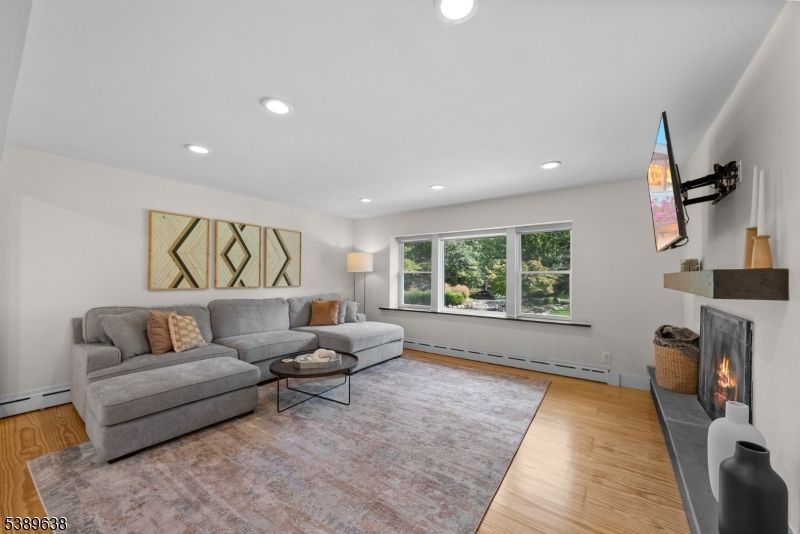 Fireplace, Interior, Living room, Recessed Lighting, Wood Texture Flooring