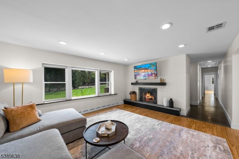 Fireplace, Interior, Living room, Recessed Lighting, Wood Texture Flooring