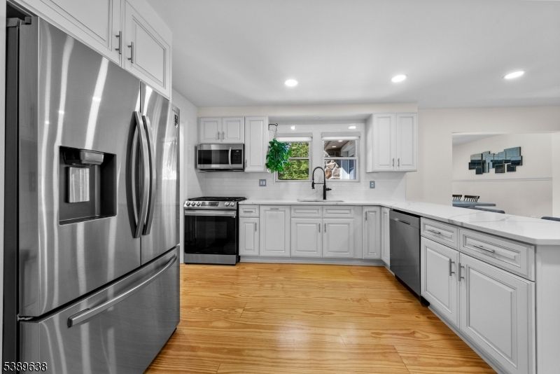 Interior, Kitchen, Recessed Lighting, Stainless Steel Appliances, Wood Texture Flooring
