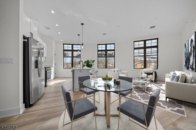 Dining room, Interior, Kitchen, Living room, Pendant Lights, Recessed Lighting, Stainless Steel Appliances, Wood Texture Flooring