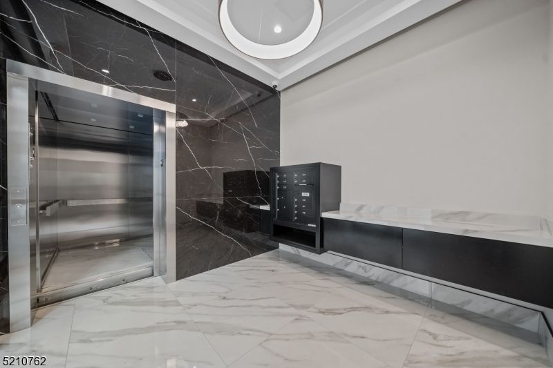 Elevator, Interior, Marble, Marble Walls, Recessed Lighting