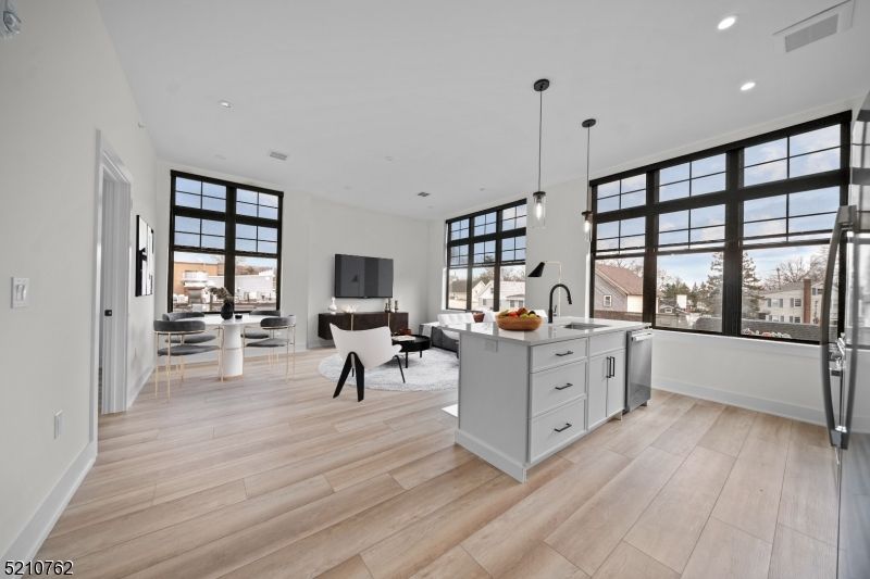 Dining room, Interior, Kitchen, Living room, Pendant Lights, Recessed Lighting, Wood Texture Flooring