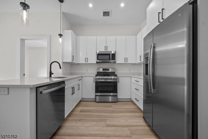 Interior, Kitchen, Pendant Lights, Recessed Lighting, Stainless Steel Appliances, Wood Texture Flooring