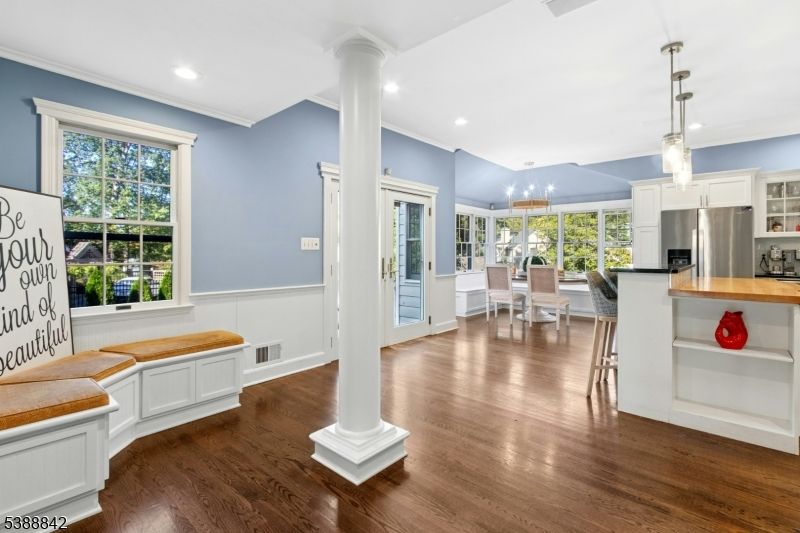 Dining room, Interior, Kitchen, Pendant Lights, Recessed Lighting, Stainless Steel Appliances, Wood Texture Flooring