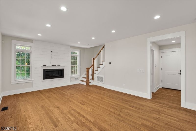 Empty room, Fireplace, Interior, Recessed Lighting, Wood Texture Flooring