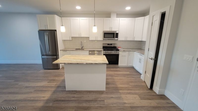 Interior, Kitchen, Pendant Lights, Recessed Lighting, Stainless Steel Appliances, Wood Texture Flooring