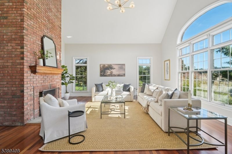 Fireplace, Interior, Living room, Pendant Lights, Recessed Lighting, Stone Walls, Wood Texture Flooring