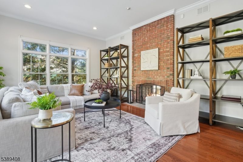 Fireplace, Interior, Living room, Recessed Lighting, Stone Walls, Wood Texture Flooring