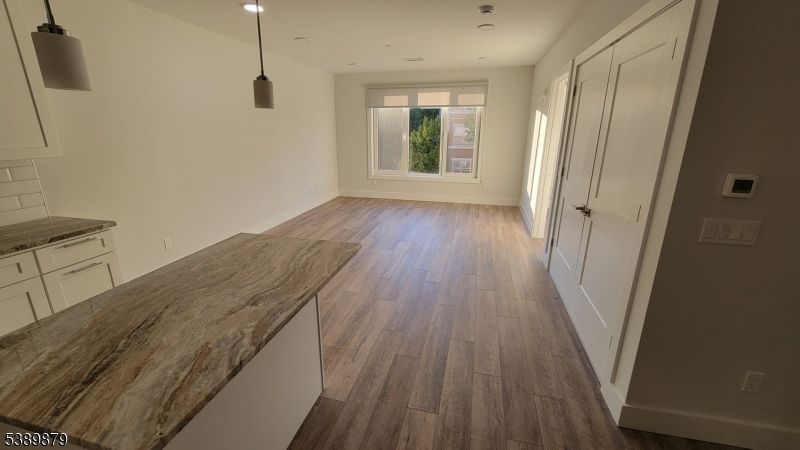 Empty room, Interior, Pendant Lights, Recessed Lighting, Wood Texture Flooring