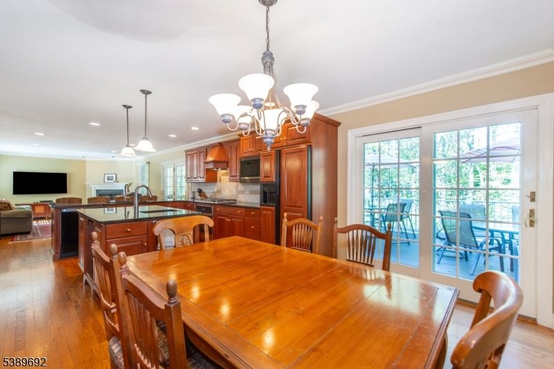 Chandelier, Dining room, Interior, Kitchen, Pendant Lights, Recessed Lighting, Wood Texture Flooring