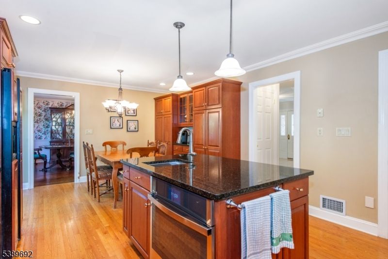 Chandelier, Dining room, Interior, Kitchen, Pendant Lights, Recessed Lighting, Wood Texture Flooring