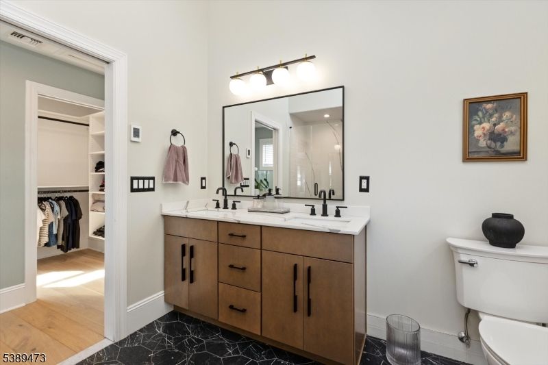 Bathroom, Dual Sink Vanities, Interior, Walk-in Closets, Wood Texture Flooring