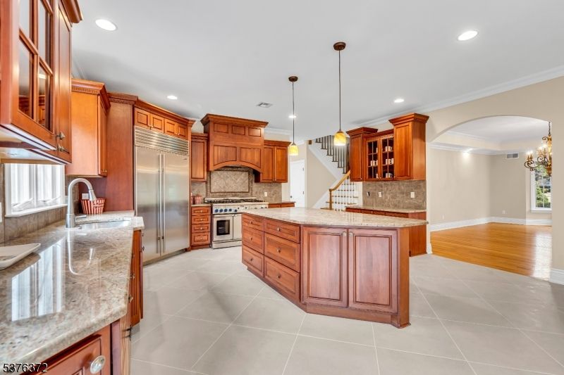 Chandelier, Interior, Kitchen, Pendant Lights, Recessed Lighting, Stainless Steel Appliances, Wood Texture Flooring