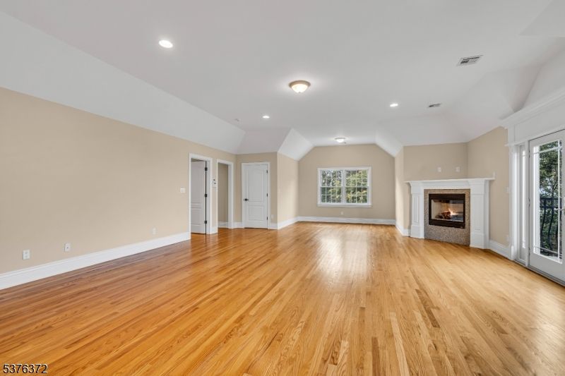Empty room, Fireplace, Interior, Recessed Lighting, Wood Texture Flooring