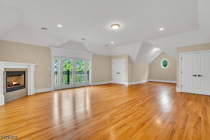 Empty room, Fireplace, Interior, Recessed Lighting, Wood Texture Flooring