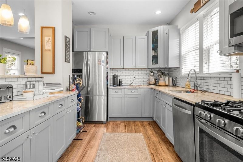 Interior, Kitchen, Pendant Lights, Recessed Lighting, Stainless Steel Appliances, Wood Texture Flooring