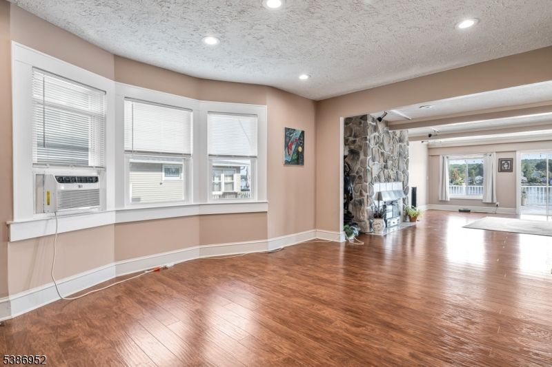 Empty room, Interior, Recessed Lighting, Stone Walls, Wood Texture Flooring