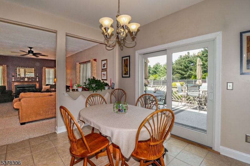 Chandelier, Dining room, Fireplace, Interior, Living room