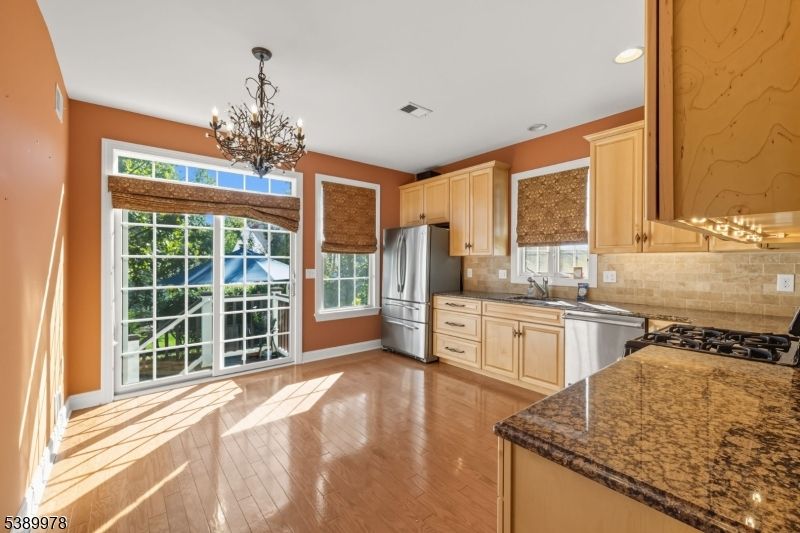Chandelier, Interior, Kitchen, Recessed Lighting, Stainless Steel Appliances, Wood Texture Flooring