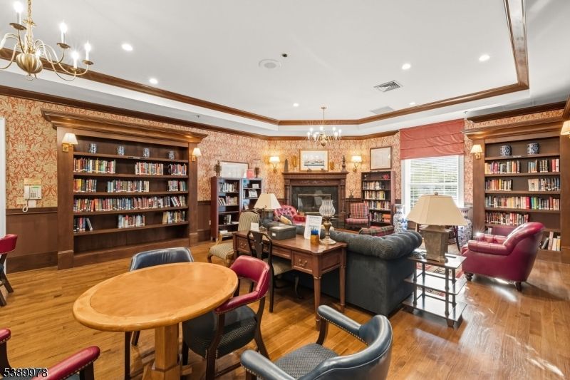 Chandelier, Fireplace, Interior, Living room, Recessed Lighting, Wood Texture Flooring