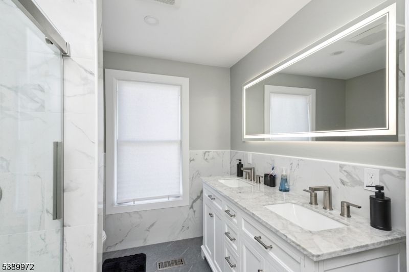 Bathroom, Dual Sink Vanities, Glass Shower, Interior, Marble Walls