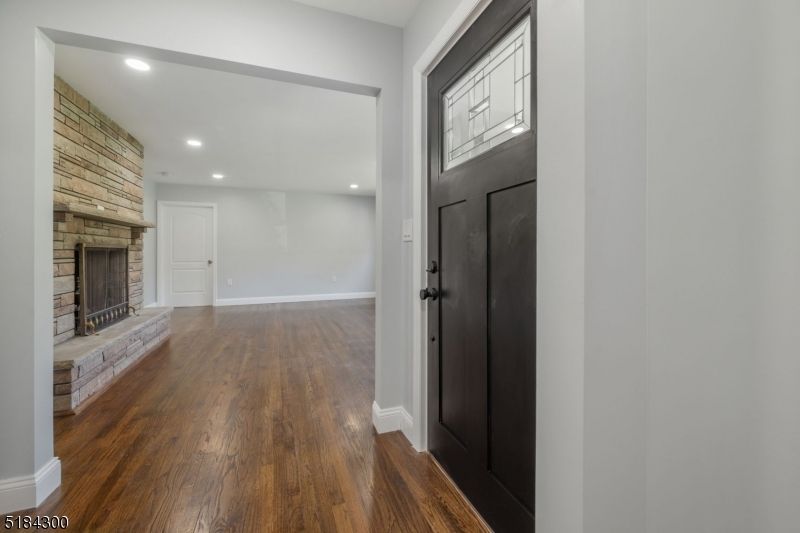 Empty room, Fireplace, Interior, Recessed Lighting, Wood Texture Flooring