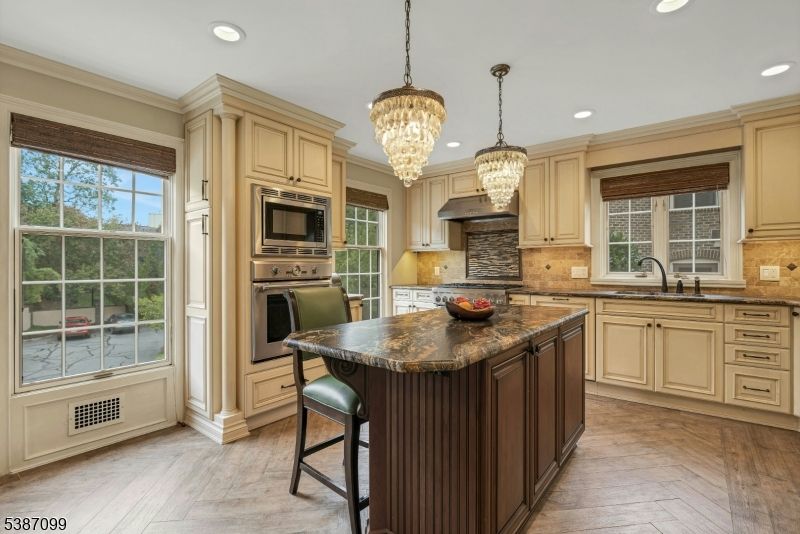 Chandelier, Interior, Kitchen, Recessed Lighting, Stainless Steel Appliances, Wood Texture Flooring