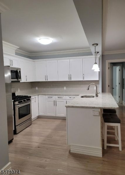 Interior, Kitchen, Pendant Lights, Stainless Steel Appliances, Wood Texture Flooring