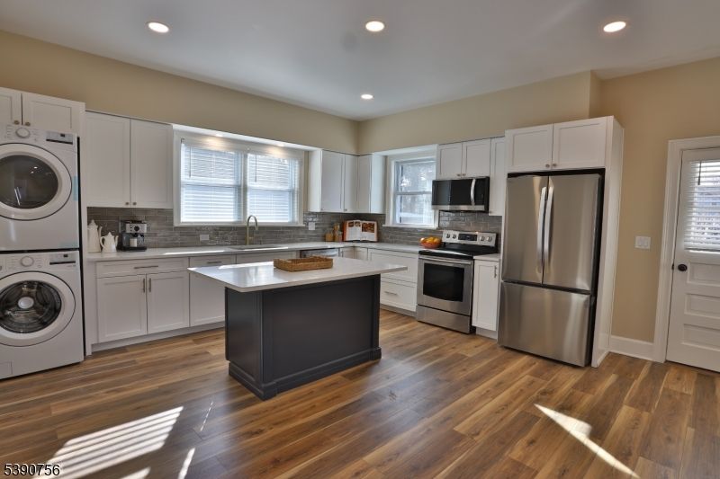 Interior, Kitchen, Recessed Lighting, Stainless Steel Appliances, Washer, Wood Texture Flooring