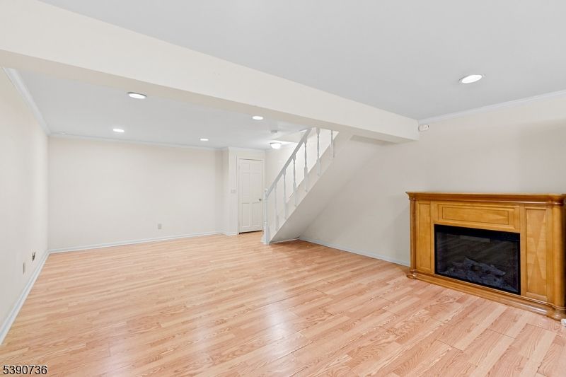 Empty room, Fireplace, Interior, Recessed Lighting, Wood Texture Flooring