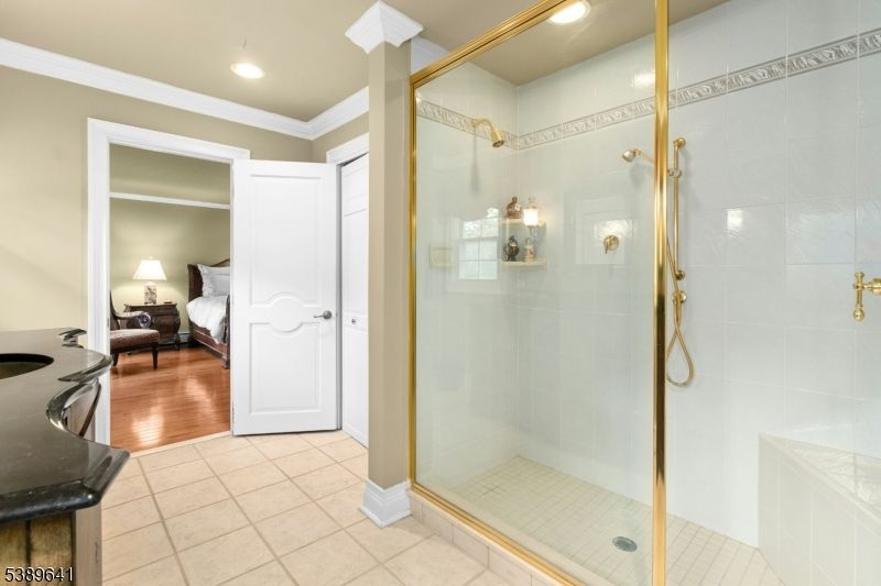 Bathroom, Bedroom, Glass Shower, Interior, Recessed Lighting, Wood Texture Flooring
