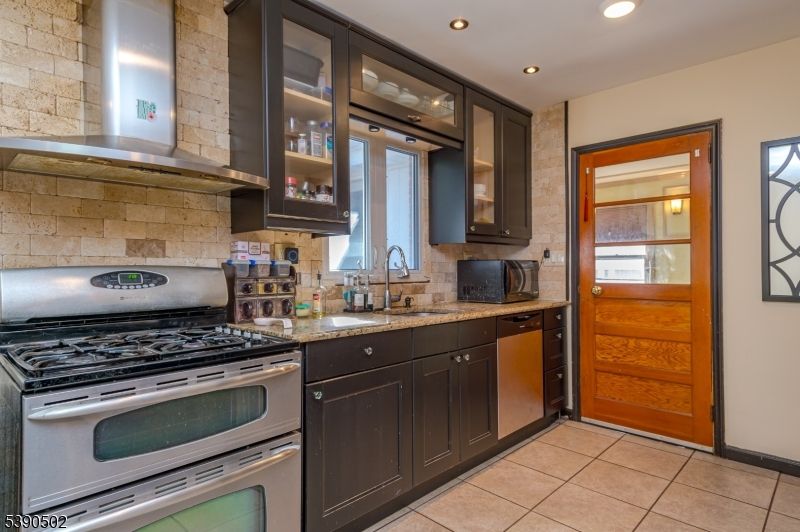 Interior, Kitchen, Recessed Lighting, Stainless Steel Appliances, Stone Walls