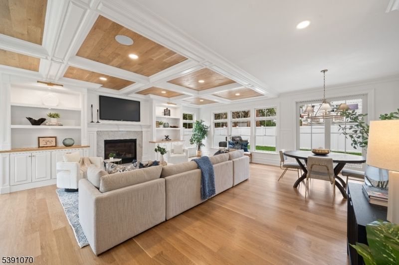 Dining room, Fireplace, Interior, Living room, Pendant Lights, Recessed Lighting, Wood Texture Flooring