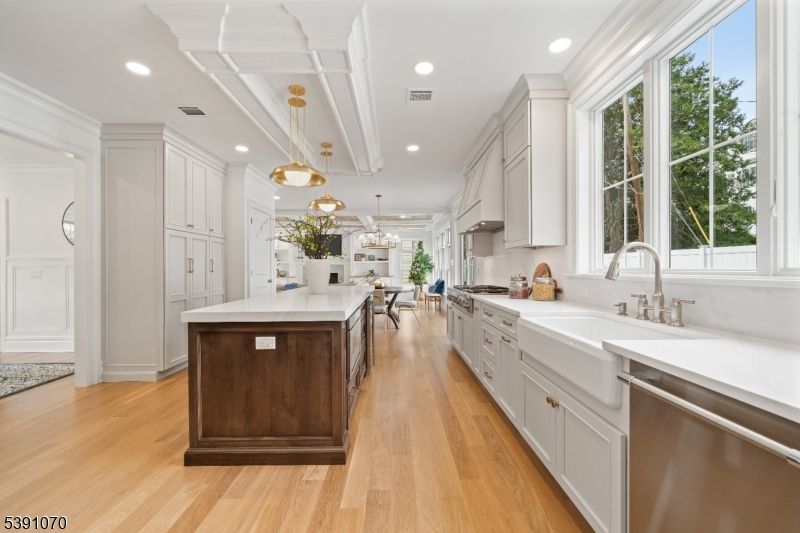 Dining room, Interior, Kitchen, Pendant Lights, Recessed Lighting, Stainless Steel Appliances, Wood Texture Flooring
