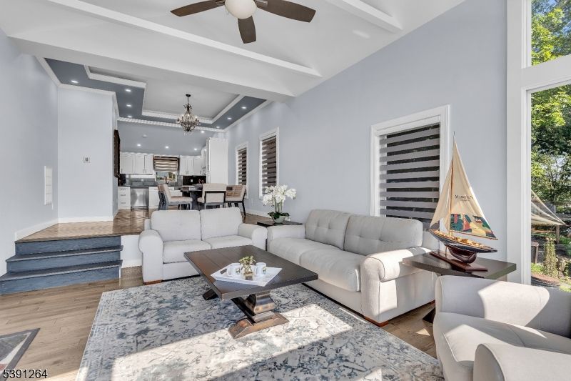 Chandelier, Dining room, Interior, Kitchen, Living room, Recessed Lighting, Stainless Steel Appliances, Wood Texture Flooring