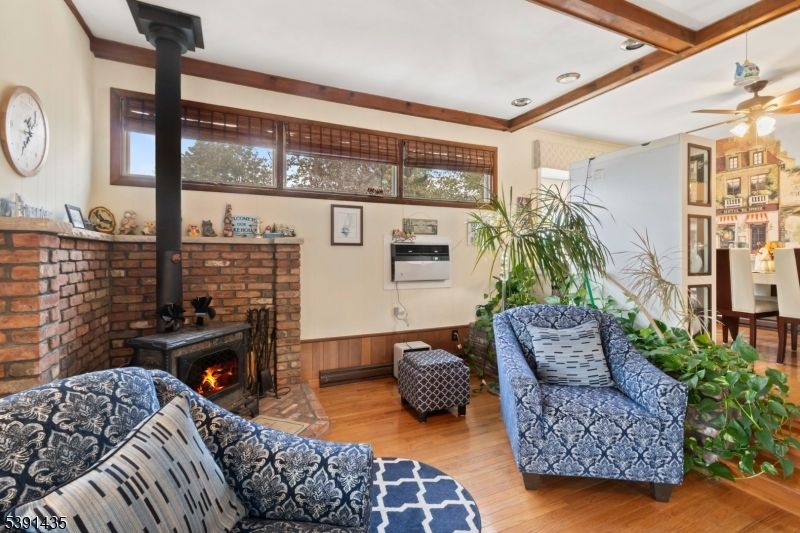 Fireplace, Interior, Living room, Recessed Lighting, Stone Walls, Wooden Beams, Wood Texture Flooring