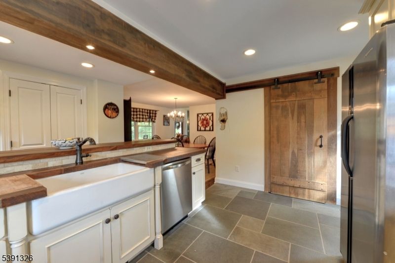 Chandelier, Dining room, Interior, Kitchen, Recessed Lighting, Stainless Steel Appliances, Wooden Beams