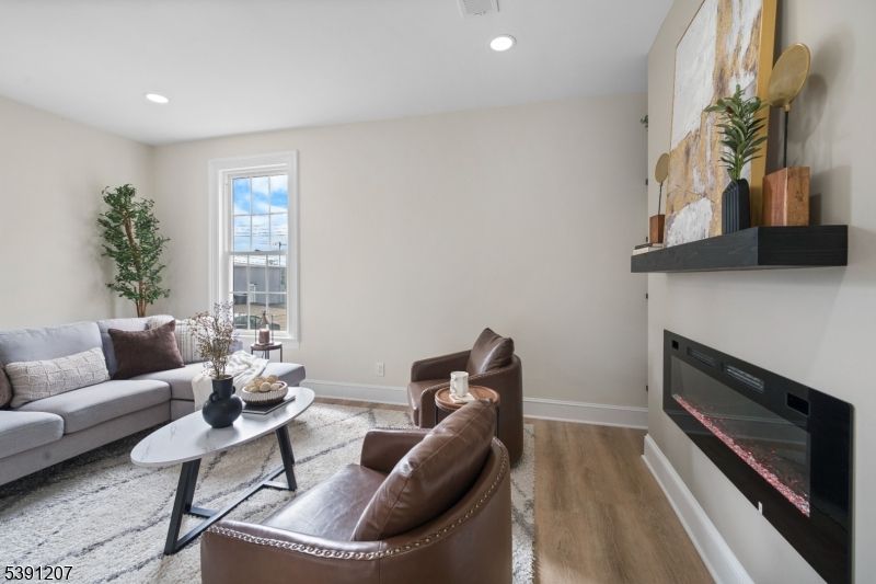 Fireplace, Interior, Living room, Recessed Lighting, Wood Texture Flooring
