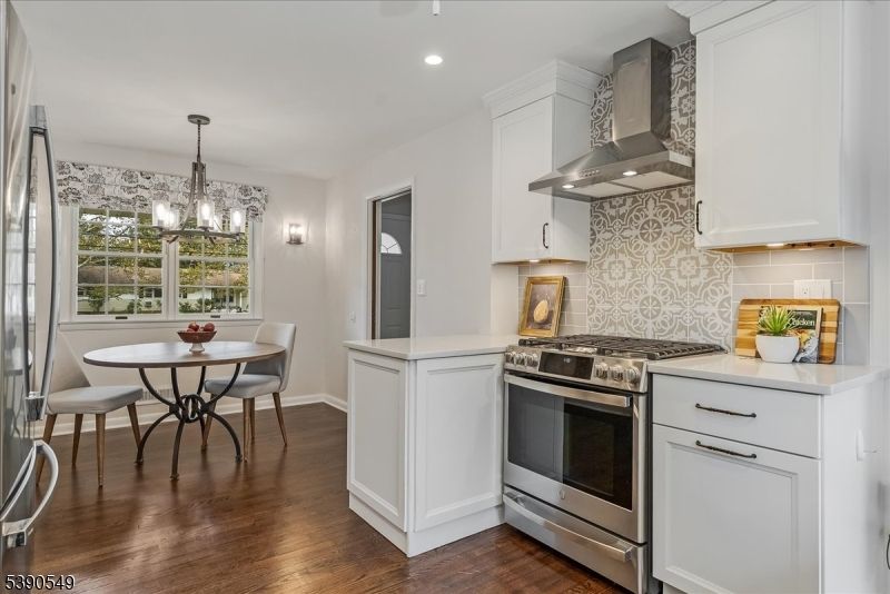 Chandelier, Dining room, Interior, Kitchen, Recessed Lighting, Stainless Steel Appliances, Wood Texture Flooring