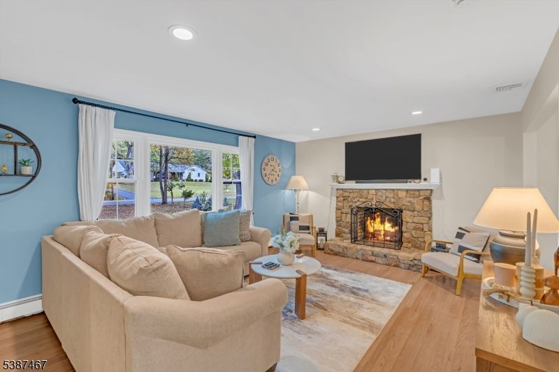 Fireplace, Interior, Living room, Recessed Lighting, Wood Texture Flooring