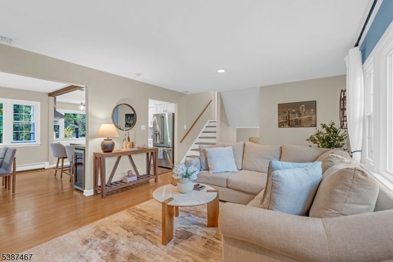 Dining room, Interior, Kitchen, Living room, Recessed Lighting, Stainless Steel Appliances, Wood Texture Flooring