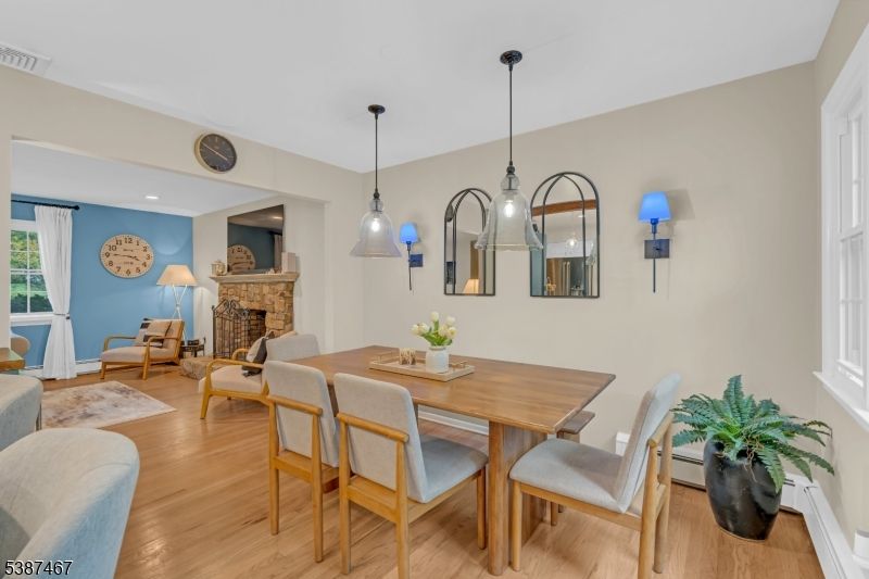 Dining room, Fireplace, Interior, Pendant Lights, Recessed Lighting, Wood Texture Flooring