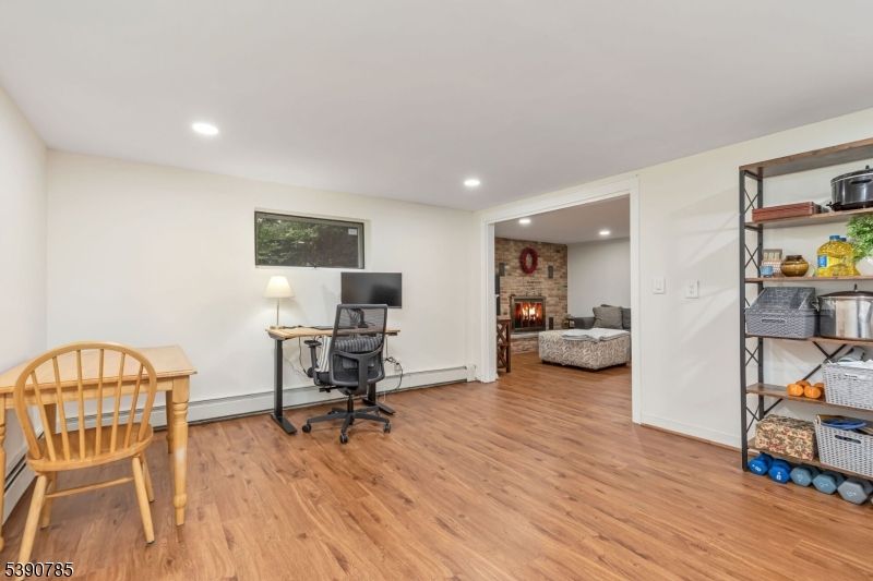 Fireplace, Home Office, Interior, Recessed Lighting, Stone Walls, Wood Texture Flooring