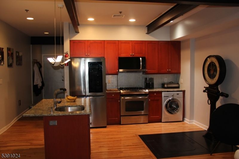 Interior, Kitchen, Pendant Lights, Recessed Lighting, Stainless Steel Appliances, Washer, Wood Texture Flooring