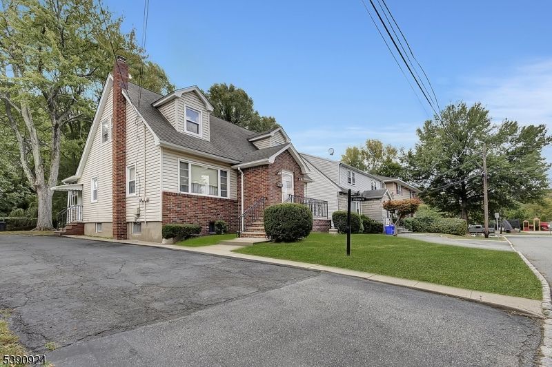 Exterior, Facade, Brick Facade, Cape Cod