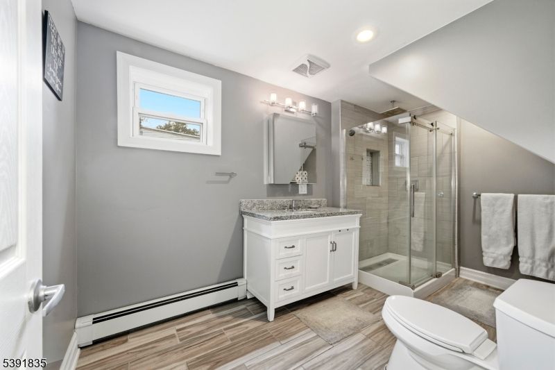 Bathroom, Glass Shower, Interior, Recessed Lighting, Wood Texture Flooring