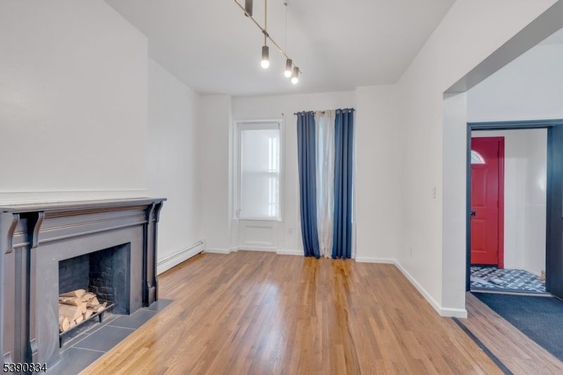 Empty room, Fireplace, Interior, Pendant Lights, Wood Texture Flooring