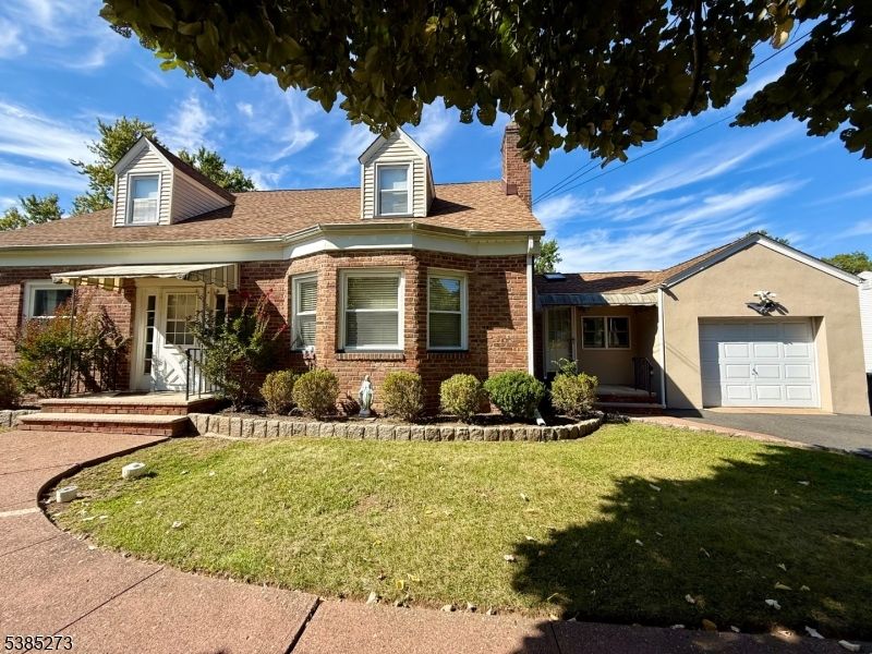 Attached, Exterior, Facade, Brick Facade, Cape Cod